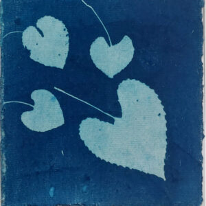 4 small heart shaped violet leaves on dark blue square, over vertical lighter blue mulberry paper, on white card